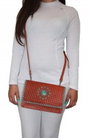 /album/fotogaleria-bandolera-pawnees-camel/marron-y-azul-bolso-colgado1-jpg/